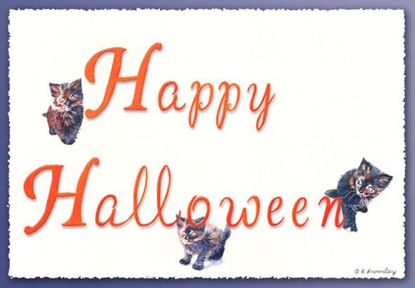 "Happy Halloween" message hand-lettered, with three cats among the letters. 
